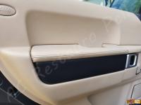 Range Rover Vogue TDV8 (L322) - anno 2008 - Restauro completo dell’interno in pelle e delle plastiche  - Pannello porta posteriore sinistro. (DOPO)