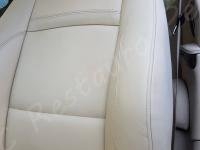 BMW 335d E92 - anno 2010 - Restauro sedili, volante e lavaggio abitacolo. - Dettaglio del fianchetto esterno sedile di guida. (DOPO)