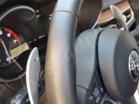 Alfa Romeo Stelvio 2000 turbo Q4 - anno 2017 - Pulizia e trattamento dell’interno in pelle - Dettaglio della corona del volante. (DOPO)
