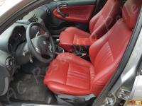 Alfa Romeo 147 - anno 2006 - Restauro volante e trattamento interno in pelle  - Panoramica dell'abitacolo lato guida. (DOPO)