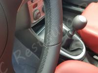 Alfa Romeo 147 - anno 2006 - Restauro volante e trattamento interno in pelle  - Particolare della parte bassa della corona. (DOPO)