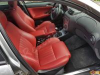 Alfa Romeo 147 - anno 2006 - Restauro volante e trattamento interno in pelle  - Panoramica abitacolo lato passeggero. (DOPO)