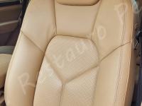 Porsche Cayenne 2012 - Lavaggio completo dell’interno in pelle e della moquette - Particolare dello schienale di guida. (DOPO)