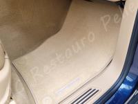Porsche Cayenne 2012 - Lavaggio completo dell’interno in pelle e della moquette - Zona piedi passeggero. (DOPO)