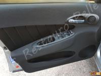 Alfa Romeo 156  - anno 2004 - Restauro volante, lavaggio interno e restauro plastiche. - Panoramica portiera lato guida. (DOPO)