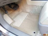 Nissan Murano  - anno 2009 - Pulizia interno in pelle e restauro pomello cambio - Particolare della zona piedi lato guida. (DOPO)