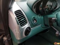 Porsche 911 Carrera 4 (996) - anno 1999 - Restauro completo dell’interno in pelle e della radica - Particolare della bocchetta aria lato guida. (DOPO)