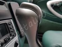 Porsche 911 Carrera 4 (996) - anno 1999 - Restauro completo dell’interno in pelle e della radica - Dettaglio della leva del cambio automatico. (DOPO)