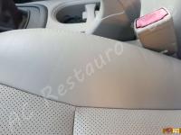 Ssangyong Korando - anno 2015 - Pulizia interno in pelle e restauro volante - Dettaglio del fianchetto destro della seduta lato guida. (DOPO)