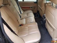 Range Rover Vogue TDV8 (L322) - anno 2008 - Restauro completo dell’interno in pelle e delle plastiche  - Panoramica divano posteriore. (PRIMA)