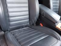 Alfa Romeo Stelvio 2000 turbo Q4 - anno 2017 - Pulizia e trattamento dell’interno in pelle - Panoramica sedile passeggero. (PRIMA)