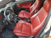 Alfa Romeo 147 - anno 2006 - Restauro volante e trattamento interno in pelle  - Panoramica dell'abitacolo lato guida. (PRIMA)