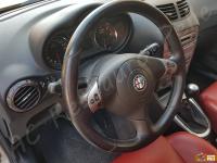 Alfa Romeo 147 - anno 2006 - Restauro volante e trattamento interno in pelle  - Panoramica del volante. (PRIMA)