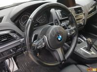 BMW 125d M-sport: Rivestimento in vera pelle e personalizzazione volante  - Panoramica del volante montato sull'auto. (PRIMA)