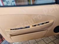 Ferrari F430 spider – Restauro plastiche appiccicose >>>>>>>>>>>> - 50/50 Pulito/Sporco su pannello porta lato guida. (PRIMA)