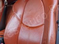 Porsche Cayman S – Restauro completo interno (pelle e plastiche) >>> - Particolare dello schienale di guida. (PRIMA)