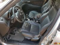 Alfa Romeo 156  - anno 2004 - Restauro volante, lavaggio interno e restauro plastiche. - Panoramica dell'abitacolo lato guida. (PRIMA)