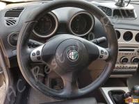 Alfa Romeo 156  - anno 2004 - Restauro volante, lavaggio interno e restauro plastiche. - Panoramica del volante. (PRIMA)