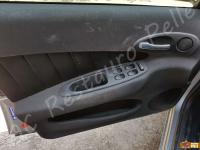 Alfa Romeo 156  - anno 2004 - Restauro volante, lavaggio interno e restauro plastiche. - Panoramica portiera lato guida. (PRIMA)