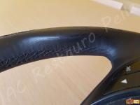 Fiat Grande Punto - anno 2009 - Rivestimento volante in vera pelle con personalizzazione - Dettaglio delle cuciture. (PRIMA)