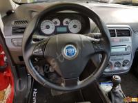 Fiat Grande Punto - anno 2009 - Rivestimento volante in vera pelle con personalizzazione - Il volante montato. (PRIMA)