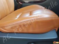 Range Rover Sport - anno 2010 - Restauro di sedili e plastiche e pulizia interno in pelle - Dettaglio del fianchetto destro seduta lato passeggero. (PRIMA)