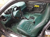 Porsche 911 Carrera 4 (996) - anno 1999 - Restauro completo dell’interno in pelle e della radica - Panoramica dell'abitacolo lato guida. (PRIMA)