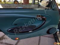 Porsche 911 Carrera 4 (996) - anno 1999 - Restauro completo dell’interno in pelle e della radica - Panoramica portiera lato guida. (PRIMA)