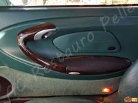 Porsche 911 Carrera 4 (996) - anno 1999 - Restauro completo dell’interno in pelle e della radica - Panoramica della portiera del passeggero. (PRIMA)
